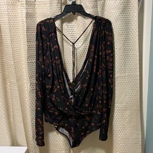 BCBG long sleeve bodysuit. Black, brown/red print
